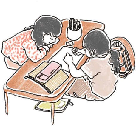 すわって本を読む子どもたち